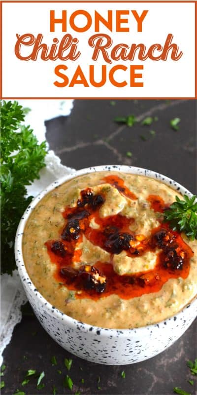 This sauce has it all! First of all, it's quite delicious; it's got heat from some chili crisp oil, coolness from the sour cream, sweetness from a bit of honey, and loads of savoury flavour from an abundance of dried herbs.  Honey Chili Ranch Sauce is great as a dip or a spread! #honey #chili #crisp #oil #sauce