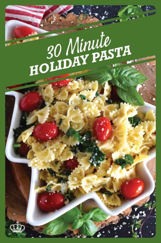 The combination of bright red cherry tomatoes and the forest green colour of sauteed kale come together to make this 30 Minute Holiday Pasta! Perfectly cooked pasta is tossed in a salted butter and garlic sauce with aromatic herbs - simple and delicious! #pasta #holiday #redandgreen #kale #tomatoes