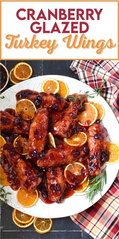 Sometimes roasting a whole turkey for the holidays can be too much, and sometimes, you just need to change things up a little! These Cranberry Glazed Turkey Wings are affordable, easy to prepare, much faster than a whole turkey, and more importantly, smothered in an easy homemade sweet and sticky cranberry sauce! #turkey #wings #cranberry #glazed #sweet #sticky