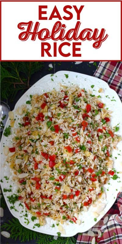 Transform inexpensive plain white rice into the most delicious holiday side dish! Prepared with fresh garlic and ginger, this rice is certainly aromatic.  Tossed with caramelized onions, roasted red peppers, and blanched almonds, Easy Holiday Rice could just become a regular part of your holiday dinners! #rice #leftover #holiday #caramelized #onion #peppers #almonds