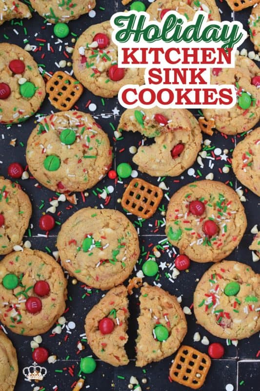 Everything but the kitchen sink is an expression used to describe a recipe with lots of ingredients. My Holiday Kitchen Sink Cookies are prepared with a basic cookie dough, but packed with pretzels, candy, sprinkles, chocolate, and even crushed potato chips! It might sound odd, but these cookies are certainly delicious! #kitchensink #christmas #cookies #M&M