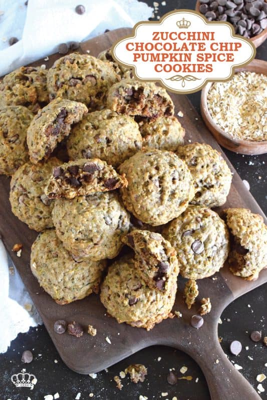 These deliciously soft and chewy cookies are baked with healthy amount of shredded zucchini and rolled oats. Flavoured with a pumpkin spice blend and sweetened with milk chocolate chips, these cookies also have crunch factor with toasted chopped walnuts! #pumpkinspice #zucchini #cookies #chocolate