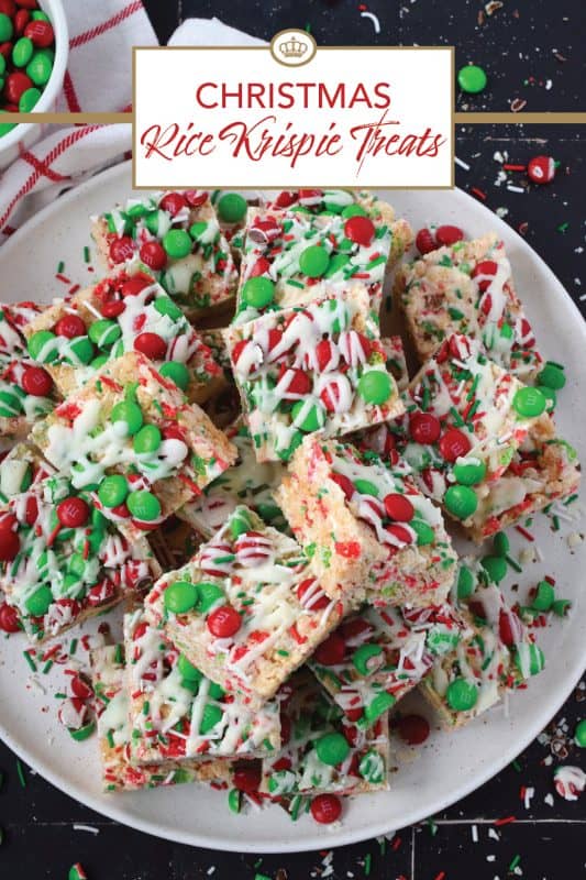 Everyone’s favourite treat, these Christmas Rice Krispie Treats are loaded with red and green candy-coated chocolates as well as festive sprinkles and drizzled with melted candy melts. Easy to prepare and fun to eat, these can be prepared with regular or vegan marshmallows if you have any dietary restrictions. #ricekrispie #mandms #mms #treats #christmas #nobake #cereal