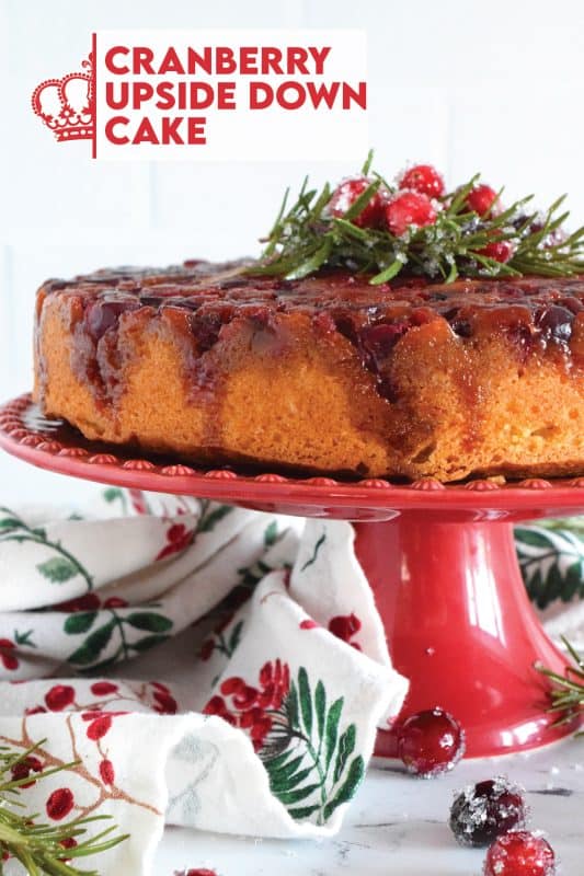 Fresh cranberries are placed in the bottom of a cake pan with a brown sugar caramel mixture. Topped with a deliciously moist vanilla batter, this Cranberry Upside Down Bundt is a perfect dessert for any holiday meal.  Garnished with cranberries and fresh rosemary sprigs, it really couldn't get any easier or any more delectable! #cranberry #cranberries #cake #upsidedown