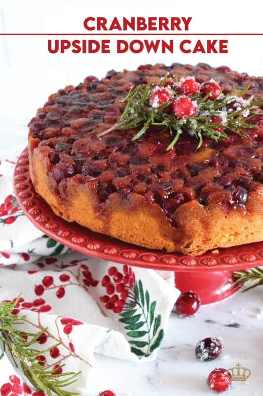 Fresh cranberries are placed in the bottom of a cake pan with a brown sugar caramel mixture. Topped with a deliciously moist vanilla batter, this Cranberry Upside Down Bundt is a perfect dessert for any holiday meal.  Garnished with cranberries and fresh rosemary sprigs, it really couldn't get any easier or any more delectable! #cranberry #cranberries #cake #upsidedown