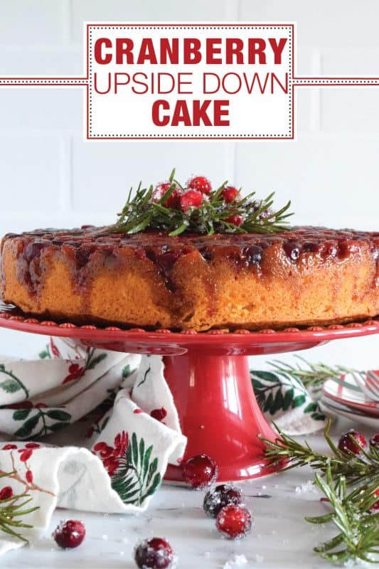 Fresh cranberries are placed in the bottom of a cake pan with a brown sugar caramel mixture. Topped with a deliciously moist vanilla batter, this Cranberry Upside Down Bundt is a perfect dessert for any holiday meal.  Garnished with cranberries and fresh rosemary sprigs, it really couldn't get any easier or any more delectable! #cranberry #cranberries #cake #upsidedown