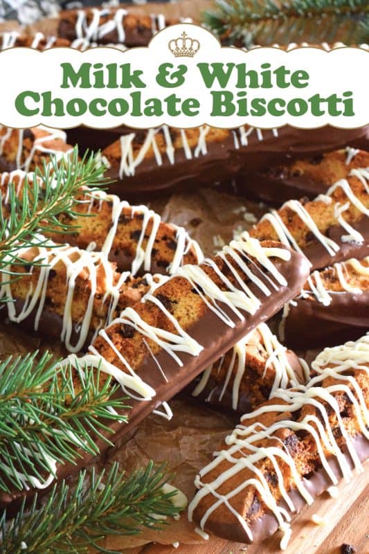 When it comes to sweet treats like biscotti, you cannot go wrong with chocolate! This recipe combines both milk and white chocolate chips into a sweet, vanilla-flavoured cookie dough.  Dip and drizzle these Milk and White Chocolate Biscotti with even more chocolate to make them even better! #biscotti #chocolate #milk #white #dipped #christmas #baking #holidays