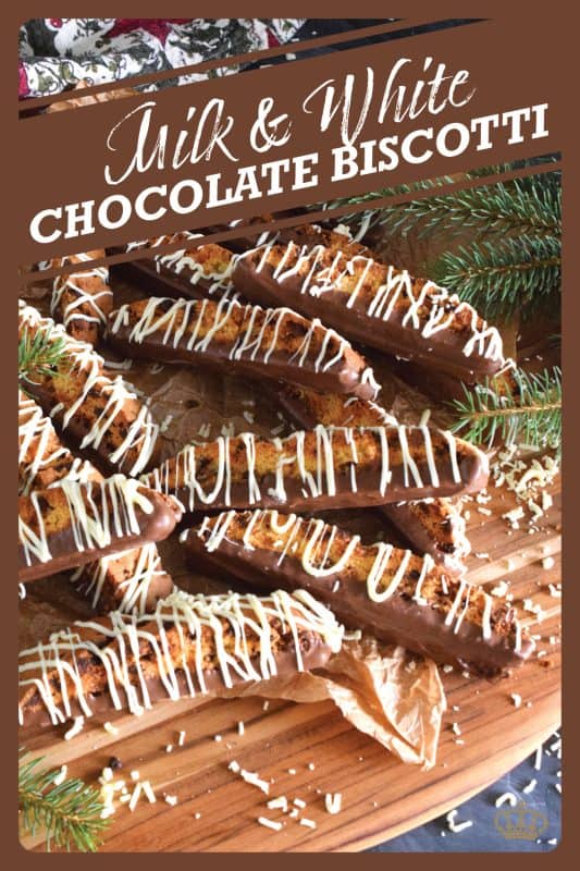 When it comes to sweet treats like biscotti, you cannot go wrong with chocolate! This recipe combines both milk and white chocolate chips into a sweet, vanilla-flavoured cookie dough.  Dip and drizzle these Milk and White Chocolate Biscotti with even more chocolate to make them even better! #biscotti #chocolate #milk #white #dipped #christmas #baking #holidays