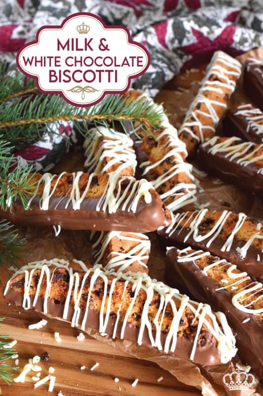When it comes to sweet treats like biscotti, you cannot go wrong with chocolate! This recipe combines both milk and white chocolate chips into a sweet, vanilla-flavoured cookie dough.  Dip and drizzle these Milk and White Chocolate Biscotti with even more chocolate to make them even better! #biscotti #chocolate #milk #white #dipped #christmas #baking #holidays