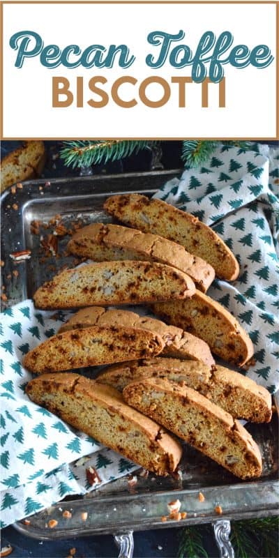 These light and crunchy Pecan Toffee Biscotti are prepared with toffee bits, toasted pecans, and warming ground cinnamon. This is a holiday confection that will be difficult to share and part with. Maybe it’s a good idea to make a double batch of these after all! #biscotti #pecan #toffee #skor #cookies