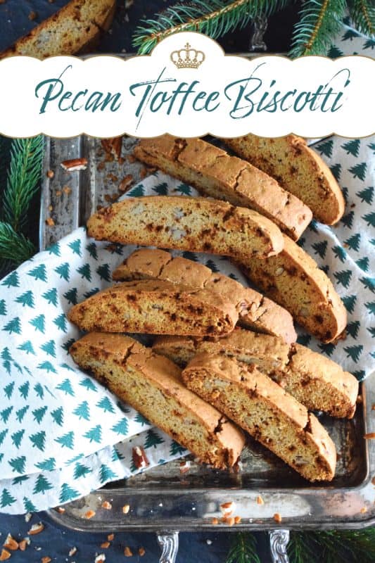 These light and crunchy Pecan Toffee Biscotti are prepared with toffee bits, toasted pecans, and warming ground cinnamon. This is a holiday confection that will be difficult to share and part with. Maybe it’s a good idea to make a double batch of these after all! #biscotti #pecan #toffee #skor #cookies