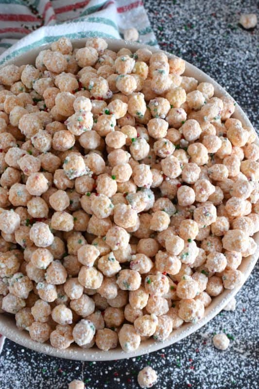 Christmas Reindeer Droppings are a no-bake, inexpensive snack that you can make this holiday season.  Prepared with only five ingredients, you could easily package this sweet and crunchy snack in cellophane bags and tie them with a festive ribbon to make a delicious gift for friends, neighbours, and coworkers! #reindeer #cereal #candy #snack #nobake #christmas #holiday #cornpops