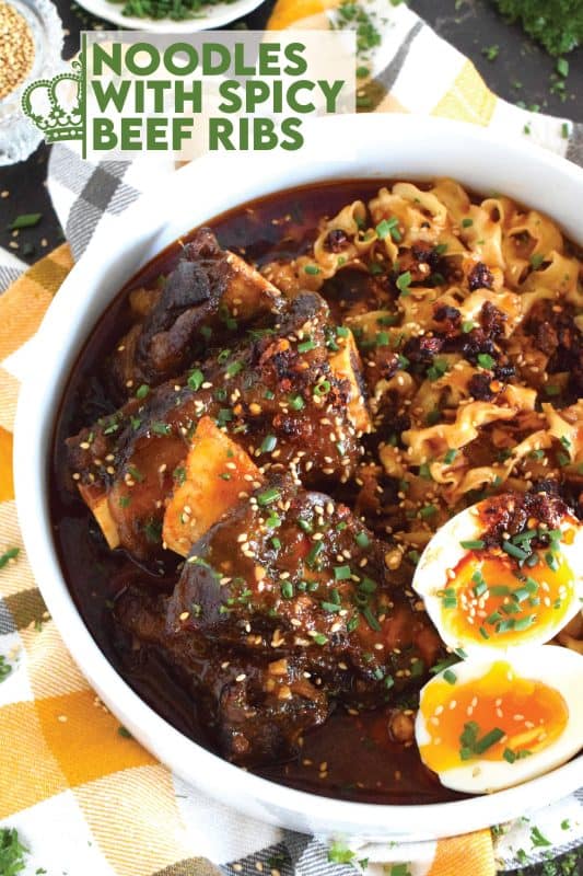 The beef is the main attraction here, but if you're a lover of ramen noodles, you will certainly love the broth the noodles are cooked in! These Noodles with Spicy Beef Ribs are certainly not on the mild side of spicy, so beware! If you prefer a mild version, the recipe card has some easy substitutions for you! #beef #beefribs #ribs #noodles #ramen #broth #spicy #dutchoven #braised #gochujang