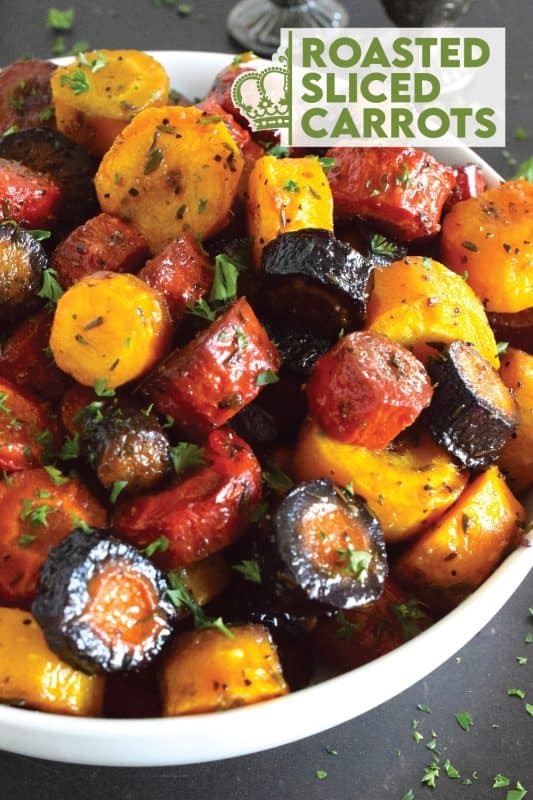 Using a combination of heirloom carrots, these Roasted Sliced Carrots are not only simple and delicious, but also quite an impressive side dish to serve with any dinner - they're even special enough for a holiday side! The rule that simple is best certainly applies here because these carrots are prepared with common pantry ingredients only! #roasted #carrots #sides #vegetables #heirloom #thanksgiving #vegetarian