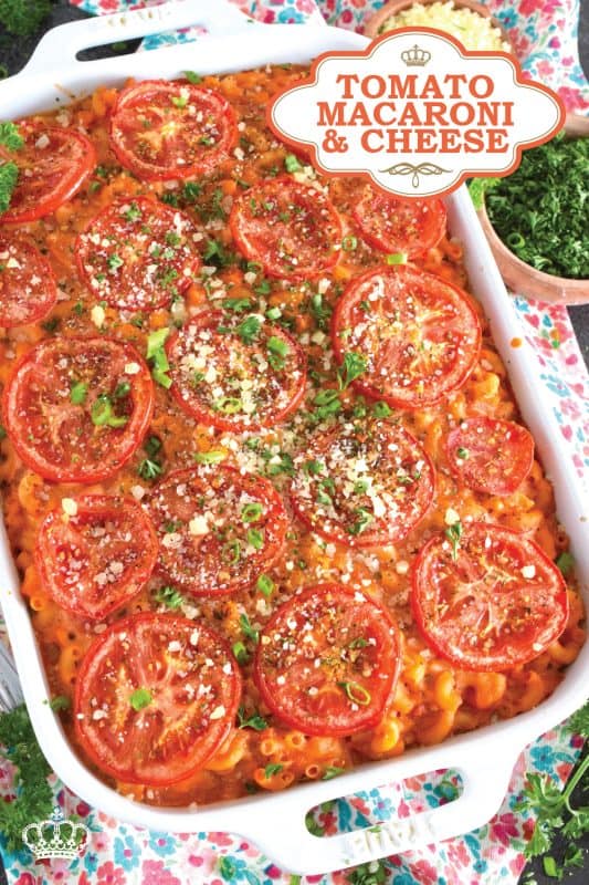 In this easy to prepare Tomato Macaroni and Cheese recipe, a classic roux is paired with fresh diced tomatoes, marinara sauce, and tomato paste, along with copius amounts of shredded cheddar cheese. Baked to perfection and topped with seasoned sliced tomatoes, this dish is absolute perfection! #macandcheese #tomatoes #macaroni #cheese #pasta