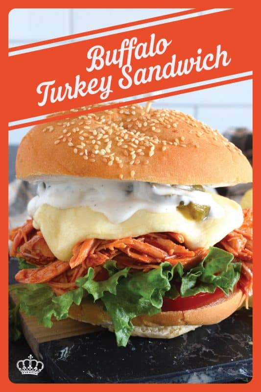 Leftover turkey never tasted so good! Shredded leftover turkey is tossed in a buffalo sauce and piled high onto your favourite sandwich bread or bun.  Topped with melted cheese and dill pickles, this Buffalo Turkey Sandwich is simple, quick, and easy, yet it tastes absolutely incredible!  #buffalo #turkey #leftover #sandwich