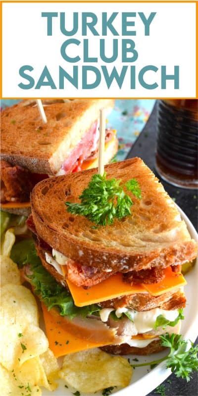 A classic restaurant-style club sandwich will never go out of style! Easily prepare these Turkey Club Sandwiches at home with leftover holiday turkey, crispy bacon slices, fresh lettuce and tomato, a good smear of mayonnaise, and some sliced sharp cheddar cheese! Everything is piled onto toasted sandwich bread and served with a side of potato chips and a pickle.  You can't beat it! #turkey #club #leftover #sandwich #clubsandwich #bacon
