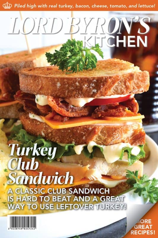 A classic restaurant-style club sandwich will never go out of style! Easily prepare these Turkey Club Sandwiches at home with leftover holiday turkey, crispy bacon slices, fresh lettuce and tomato, a good smear of mayonnaise, and some sliced sharp cheddar cheese! Everything is piled onto toasted sandwich bread and served with a side of potato chips and a pickle.  You can't beat it! #turkey #club #leftover #sandwich #clubsandwich #bacon