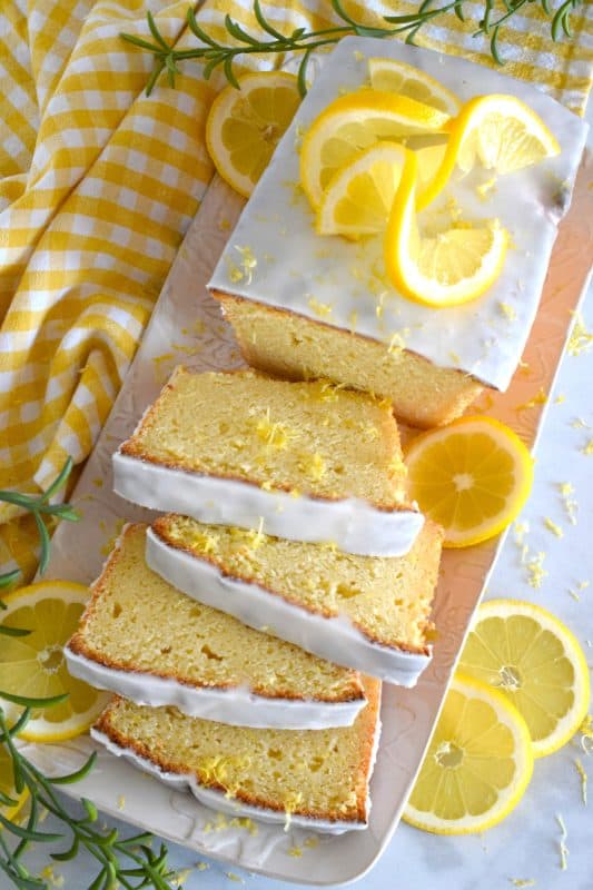 This light and fluffy Lemon Ricotta Loaf is loaded with lemony flavour which makes it perfect for springtime! The addition of the sweet glaze helps to balance the tartness of the lemon.  Prepared with a whole cup of ricotta, you just know this loaf is deliciously soft and moist! #lemon #cake #loaf #ricotta #glazed