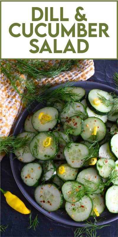 Toss cucumber slices with fresh dill fronds in a seasoned vinegar and lemon juice dressing to make this Dill and Cucumber Salad.  It's light and refreshing with just the right amount of brightness and zing.  Garnish with thinly sliced hot chilies for colour and heat. #cucumber #dill #fresh #salad #vinegar #oil