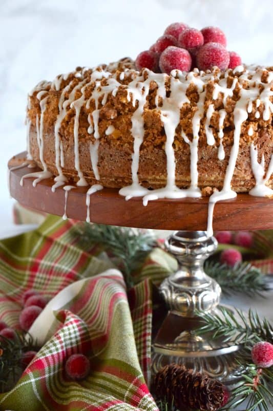 The old adage that simple is better certainly applies in the case of this Pumpkin Spice Streusel Coffee Cake. With a sweet walnut crumb topping, this delightful treat, served with a tea or coffee, is absolute perfection! – Serve with whipped cream and a drizzle of caramel sauce for a dressed up dessert! #pumpkin #pumpkinspice #streusel #cake #coffeecake