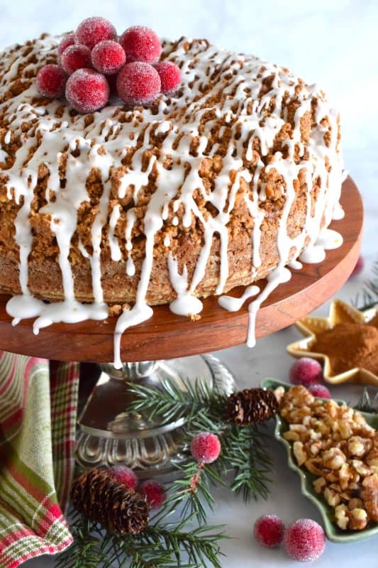 The old adage that simple is better certainly applies in the case of this Pumpkin Spice Streusel Coffee Cake. With a sweet walnut crumb topping, this delightful treat, served with a tea or coffee, is absolute perfection! – Serve with whipped cream and a drizzle of caramel sauce for a dressed up dessert! #pumpkin #pumpkinspice #streusel #cake #coffeecake