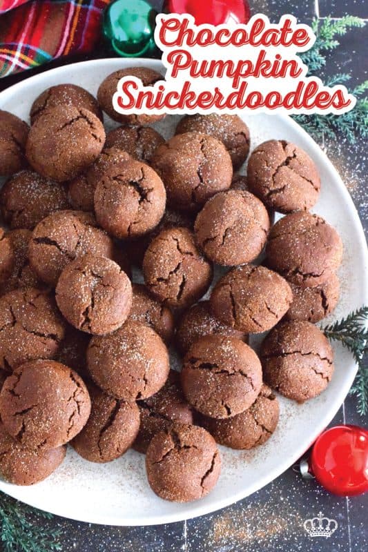 Everyone loves the original snickerdoodle cookie, but this pumpkin version is even more delicious! Prepared with brown sugar and cocoa, the cookies are also packed with pumpkin spice seasoning blend and rolled with it and sugar, which gives the cookie that recognizable and familiar crinkly appearance. Chocolate Pumpkin Snickerdoodle Cookies are soft and chewy with slightly crispy outer edges. #pumpkin #pumpkinspice #snickerdoodle #cookies #chocolate #holiday