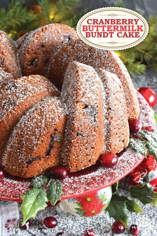A moist and delicious bundt cake made especially for Christmas. This Cranberry Buttermilk Bundt Cake is a spin on the classic Kentucky Butter Cake. Prepared with fresh cranberries, orange zest, and orange extract, this cake is kept soft and moist because it's made with buttermilk - each slice is perfection! #cranberry #cake #bundt #buttermilk #buttercake #christmas #holiday #dessert
