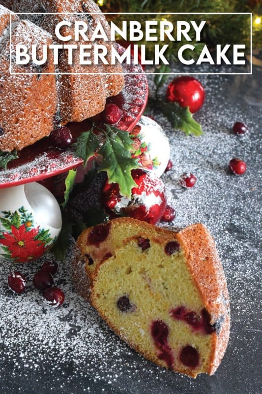 A moist and delicious bundt cake made especially for Christmas. This Cranberry Buttermilk Bundt Cake is a spin on the classic Kentucky Butter Cake. Prepared with fresh cranberries, orange zest, and orange extract, this cake is kept soft and moist because it's made with buttermilk - each slice is perfection! #cranberry #cake #bundt #buttermilk #buttercake #christmas #holiday #dessert