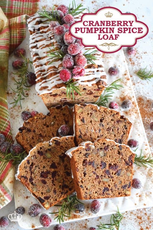 A thick slice of Cranberry Pumpkin Spice Loaf with a cup of hot tea is just the thing you need to boost your energy and spirits on a cold, autumn afternoon! Give me a good book, a comfortable chair, this loaf and some tea and I'm all set! Prepared with dried cranberries which has been soaked in strong tea, and loaded with pumpkin spice flavour, this loaf is both moist and delicious! #cranberries #cranberry #bread #loaf #pumpkin #pumpkinspice