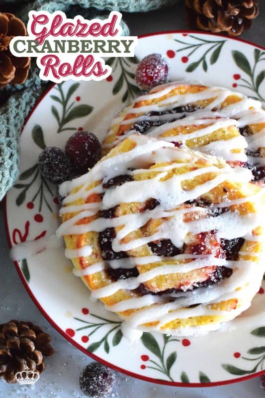 One of my favourite holiday ingredients, the delectably tart cranberry, is being put to great use today! These Glazed Cranberry Rolls are made with a light, biscuit-like dough and rolled with chunky cranberry sauce. Drizzled with a sweet glaze, these are absolutely delicious and very festive too! #cranberry #cranberries #glazed #rolls #brunch