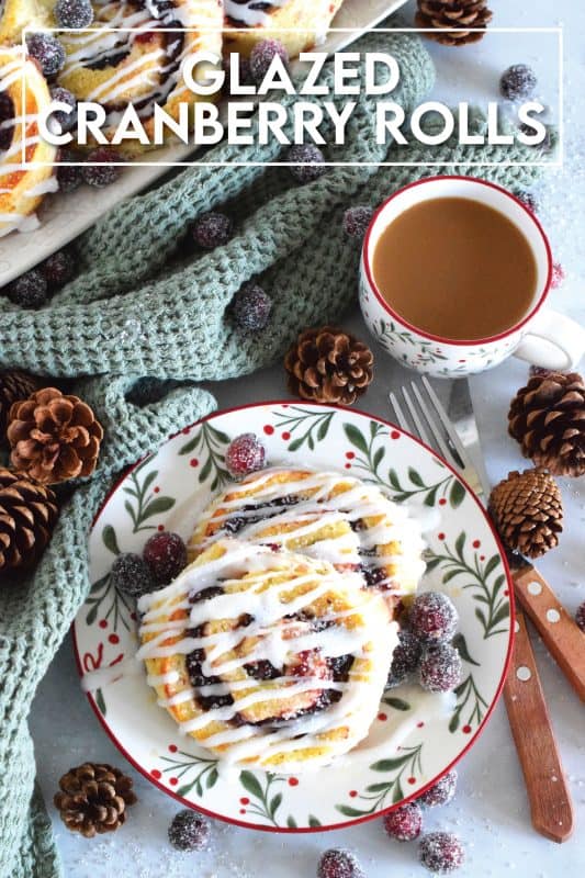 One of my favourite holiday ingredients, the delectably tart cranberry, is being put to great use today! These Glazed Cranberry Rolls are made with a light, biscuit-like dough and rolled with chunky cranberry sauce. Drizzled with a sweet glaze, these are absolutely delicious and very festive too! #cranberry #cranberries #glazed #rolls #brunch