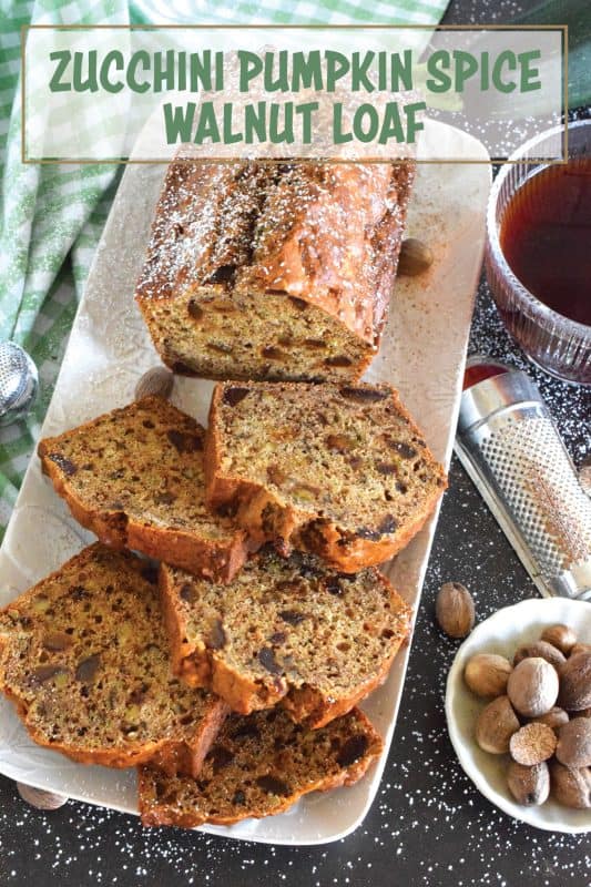 Best served with tea as an afternoon snack, this Zucchini Pumpkin Spice Walnut Loaf is very moist and packed with shredded zucchini, sweet chopped dates, and crunchy walnuts. Loaded with pumpkin spice seasoning blend, this loaf makes a great gift idea, and can be easily frozen for later too! #zucchini #loaf #bread #pumpkinspice #pumpkin