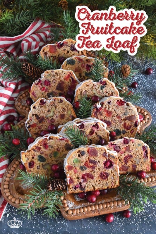Serve this Cranberry Fruitcake Tea Loaf with a cup of hot tea and enjoy some peace and quiet on a lazy, snowy afternoon. Prepared with fresh cranberries, walnuts, and dried and candied fruit which have been soaked in brewed tea to soften and moisten. This tea loaf is delicious! #cranberry #fruitcake #tealoaf #christmas #tea