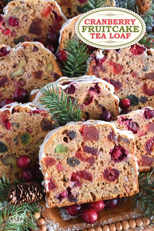 Serve this Cranberry Fruitcake Tea Loaf with a cup of hot tea and enjoy some peace and quiet on a lazy, snowy afternoon. Prepared with fresh cranberries, walnuts, and dried and candied fruit which have been soaked in brewed tea to soften and moisten. This tea loaf is delicious! #cranberry #fruitcake #tealoaf #christmas #tea