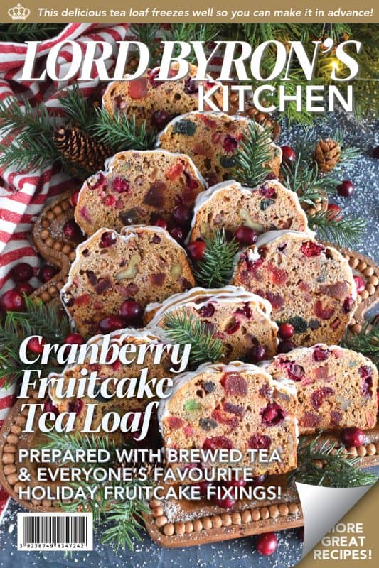 Serve this Cranberry Fruitcake Tea Loaf with a cup of hot tea and enjoy some peace and quiet on a lazy, snowy afternoon. Prepared with fresh cranberries, walnuts, and dried and candied fruit which have been soaked in brewed tea to soften and moisten. This tea loaf is delicious! #cranberry #fruitcake #tealoaf #christmas #tea