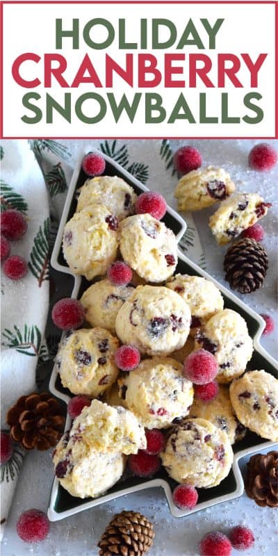 Holiday Cranberry Snowballs are packed with sweet and chewy dried cranberries that have been reconstituted with a cup of hot tea. Prepared with the most basic of pantry ingredients, these snowball cookies are nothing short of extraordinary, and they taste so delicious especially with a splash of orange extract! #holiday #baking #christmas #cranberries #snowballs #cookies