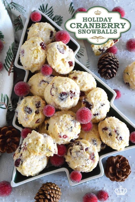 Holiday Cranberry Snowballs are packed with sweet and chewy dried cranberries that have been reconstituted with a cup of hot tea. Prepared with the most basic of pantry ingredients, these snowball cookies are nothing short of extraordinary, and they taste so delicious especially with a splash of orange extract! #holiday #baking #christmas #cranberries #snowballs #cookies