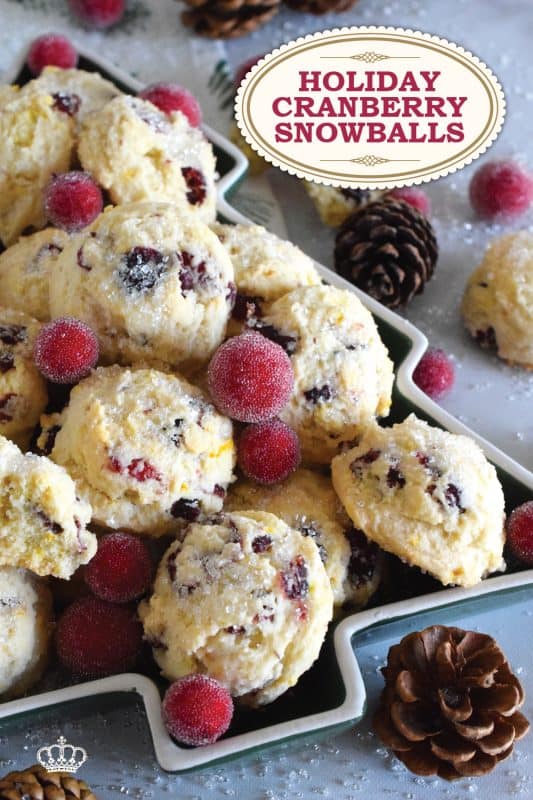 Holiday Cranberry Snowballs are packed with sweet and chewy dried cranberries that have been reconstituted with a cup of hot tea. Prepared with the most basic of pantry ingredients, these snowball cookies are nothing short of extraordinary, and they taste so delicious especially with a splash of orange extract! #holiday #baking #christmas #cranberries #snowballs #cookies