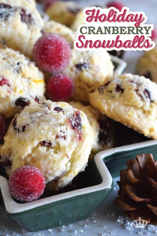 Holiday Cranberry Snowballs are packed with sweet and chewy dried cranberries that have been reconstituted with a cup of hot tea. Prepared with the most basic of pantry ingredients, these snowball cookies are nothing short of extraordinary, and they taste so delicious especially with a splash of orange extract! #holiday #baking #christmas #cranberries #snowballs #cookies