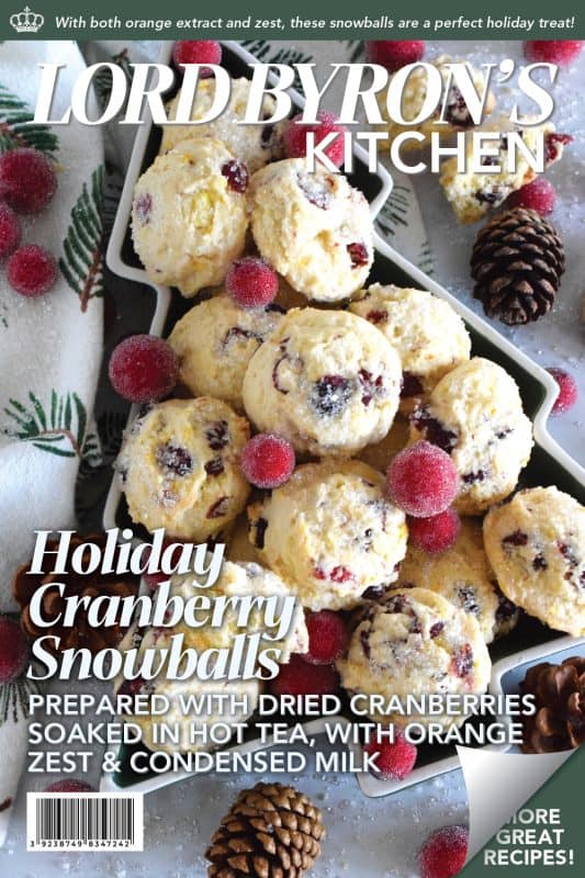 Holiday Cranberry Snowballs are packed with sweet and chewy dried cranberries that have been reconstituted with a cup of hot tea. Prepared with the most basic of pantry ingredients, these snowball cookies are nothing short of extraordinary, and they taste so delicious especially with a splash of orange extract! #holiday #baking #christmas #cranberries #snowballs #cookies