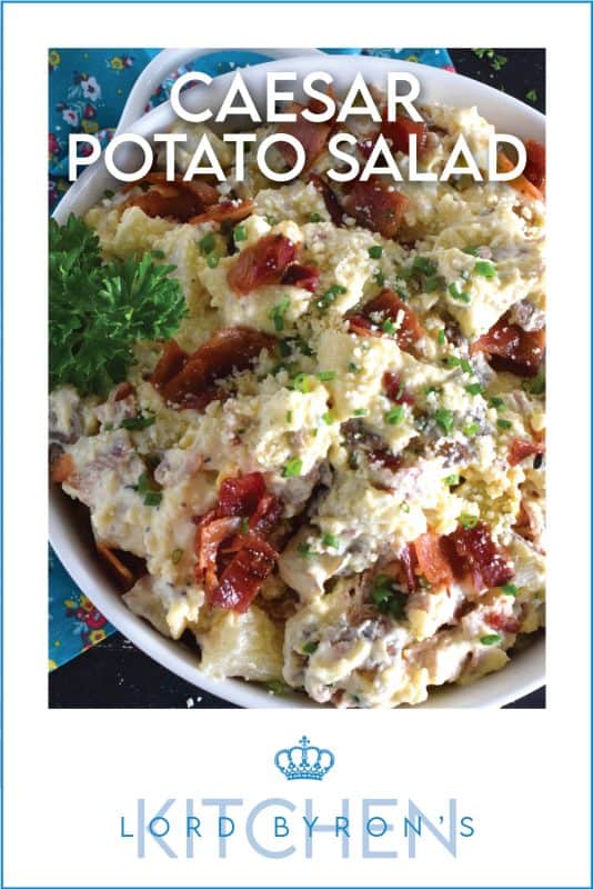 Forego the chopped lettuce and replace it with cubed baked potato to make the most delicious Caesar Potato Salad.  Loaded with bacon, hard-boiled eggs, fresh chives, and parmesan cheese, this salad is tossed with a caesar and mayo dressing.  #caesar #salad #potato #potatosalad #bakedpotato