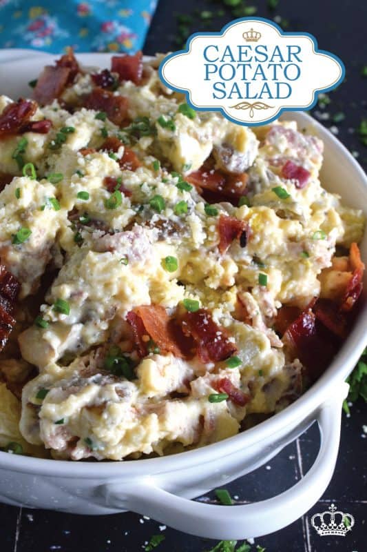 Forego the chopped lettuce and replace it with cubed baked potato to make the most delicious Caesar Potato Salad.  Loaded with bacon, hard-boiled eggs, fresh chives, and parmesan cheese, this salad is tossed with a caesar and mayo dressing.  #caesar #salad #potato #potatosalad #bakedpotato