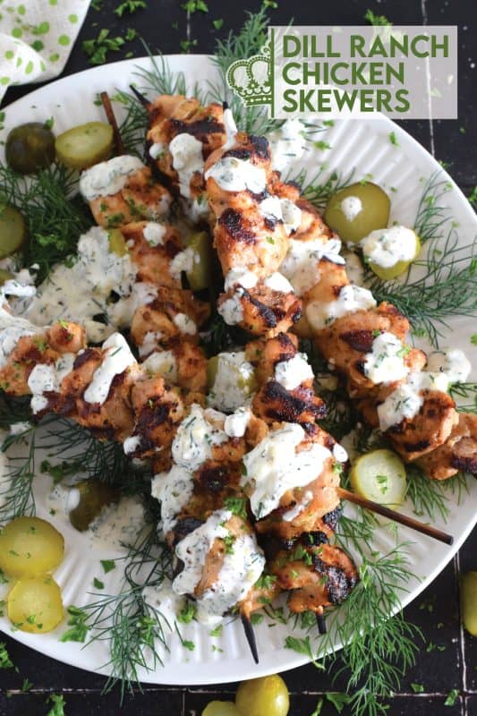 Grilled Dill Ranch Chicken Skewers are prepared by marinating boneless, skinless chicken thighs in dill pickle juice with seasonings and oil. Grilled to perfection, the chicken skewers are drizzled with a homemade dill ranch sauce. They’re moist, saucy, garlicky, and savoury! #dill #ranch #chicken #skewers #grilled #chickenthighs #dillranch #sauce
