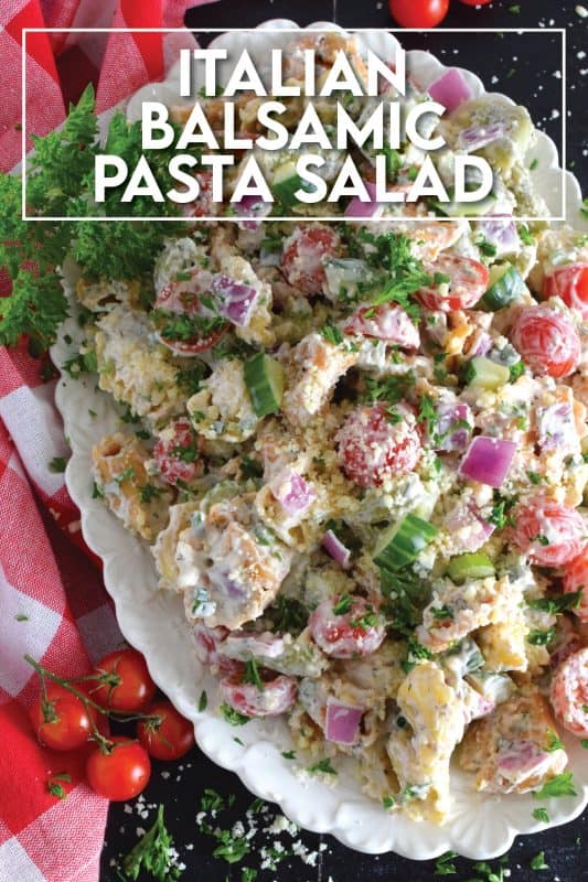 It's the combination of creamy mayonnaise with balsamic vinaigrette that makes this Italian-style pasta salad so delicious! Prepared with cheese-filled tortellini, cucumbers, tomatoes, red onions, celery, and parmesan, this salad is the perfect summer side! #pastasalad #pasta #balsamic #tortellini #side #summerside