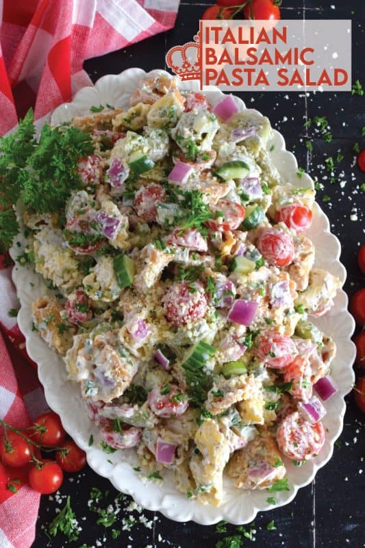 It's the combination of creamy mayonnaise with balsamic vinaigrette that makes this Italian-style pasta salad so delicious! Prepared with cheese-filled tortellini, cucumbers, tomatoes, red onions, celery, and parmesan, this salad is the perfect summer side! #pastasalad #pasta #balsamic #tortellini #side #summerside