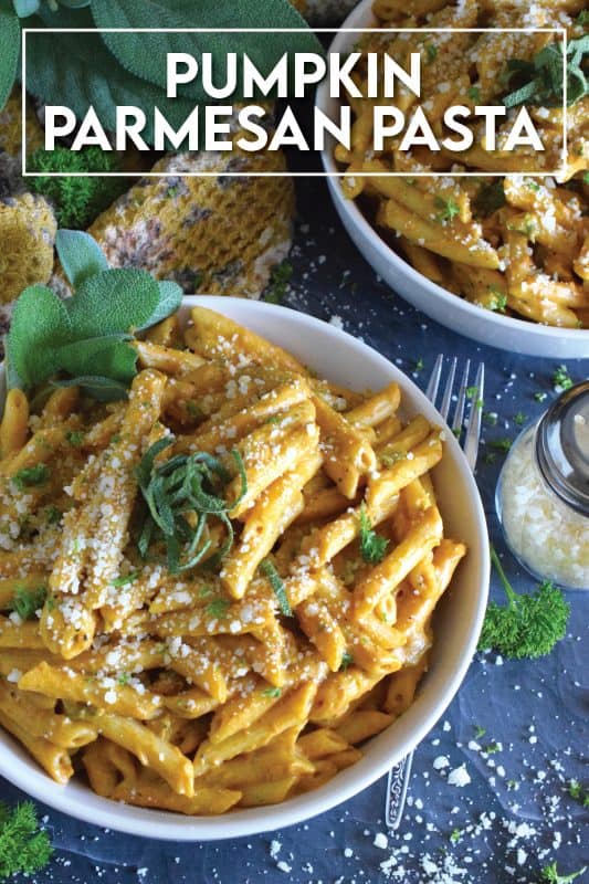 The most delicious and comforting bowl of cool weather pasta awaits! Pumpkin Parmesan Pasta is prepared with a creamy sauce made with pumpkin puree, heavy cream, sour cream, and vegetable stock. Finished with freshly grated parmesan and fresh sage, this is one pasta recipe you'll to make over and over again! #pasta #pumpkin #pumpkinpuree #pumpkinspice #pennepasta #fallrecipes