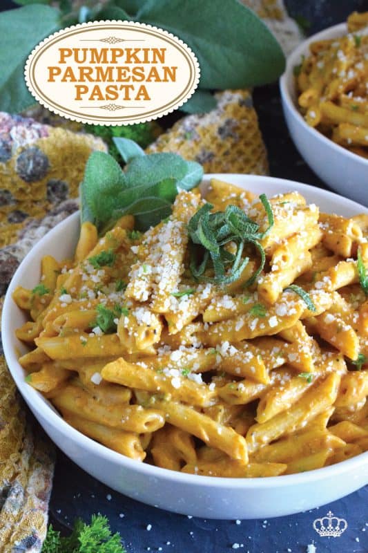 The most delicious and comforting bowl of cool weather pasta awaits! Pumpkin Parmesan Pasta is prepared with a creamy sauce made with pumpkin puree, heavy cream, sour cream, and vegetable stock. Finished with freshly grated parmesan and fresh sage, this is one pasta recipe you'll to make over and over again! #pasta #pumpkin #pumpkinpuree #pumpkinspice #pennepasta #fallrecipes