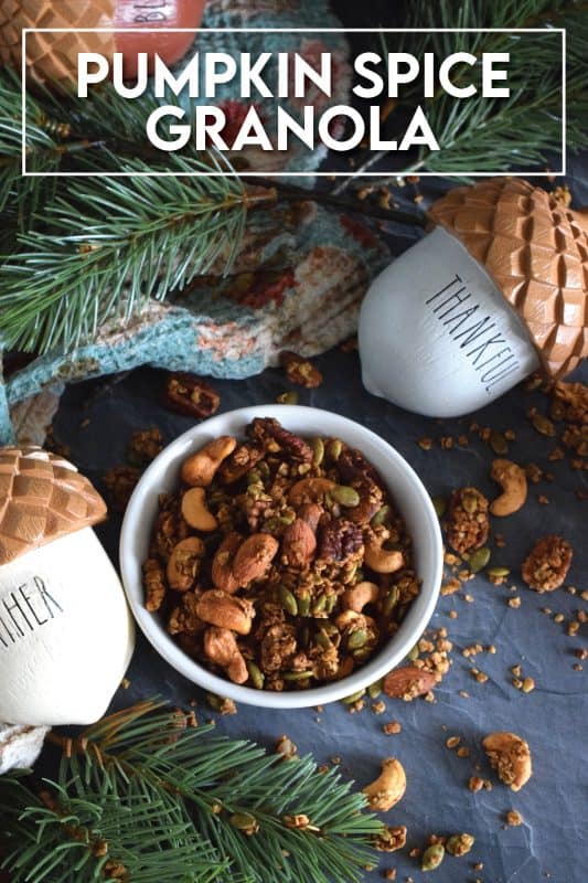 Prepared with both pumpkin puree and pumpkin spice, this Pumpkin Spice Granola is packed with good-for-you ingredients. Almonds, cashews, pecans, and pumpkin seeds help to flavour and bulk up this deliciously healthy snack. Baked with maple syrup and brown sugar, this granola makes a very delicious giftable treat too! #pumpkinspice #granola #pumpkin