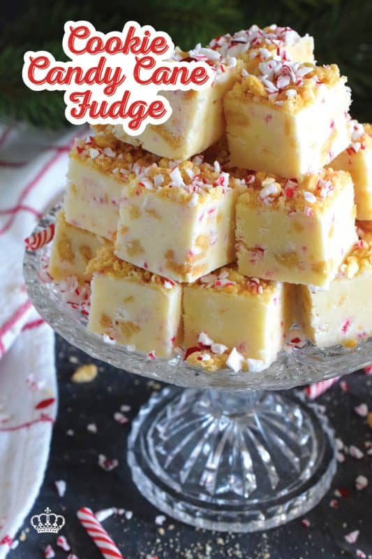 This no-bake fudge recipe is packed full of crushed cookies and crushed candy canes too. Made with melted white chocolate and canned sweetened condensed milk, Cookie Candy Cane Fudge is super easy and fast to make and tastes delicious too! #fudge #candycane #peppermint #nobake #cookie